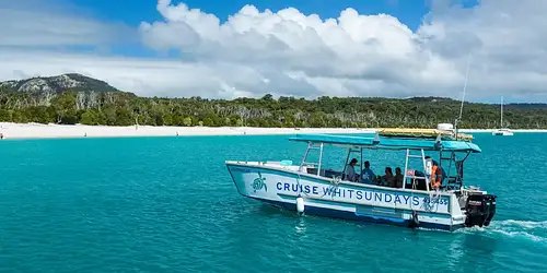 Scenic cruise through Whitsunday Islands on modern passenger vessel