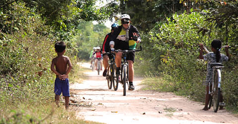 Connect with locals on your cycle across Cambodia