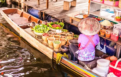 Damnoen Saduak Floating Market and Maeklong Railway Guided Tour