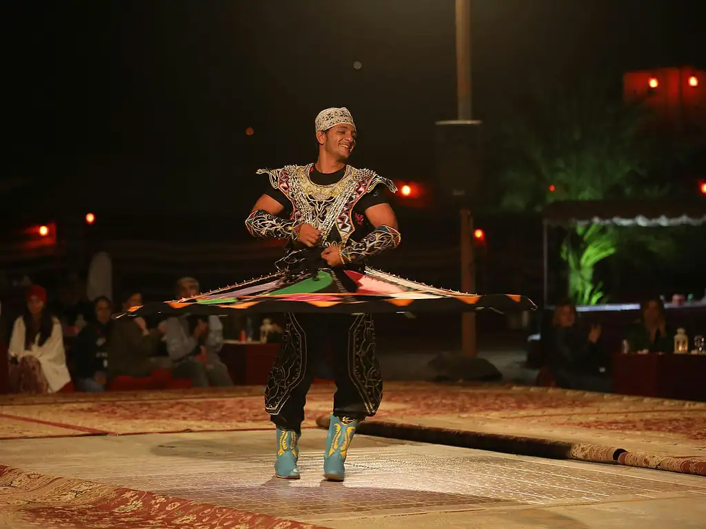Abu Dhabi desert safari with BBQ, camel ride and sandboarding