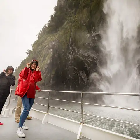 Milford-Sound-Nature-Cruise-cruising-into-the-Stirling-Falls-screen.jpg