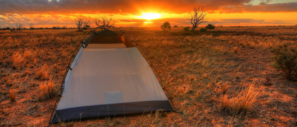 Watching sunset while camping at Uluru